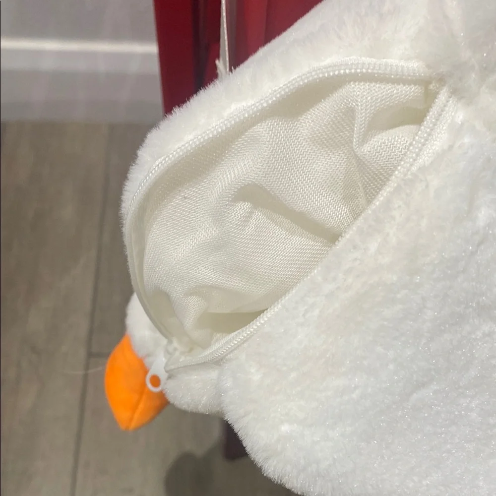 Plush White and Orange Bird purse.